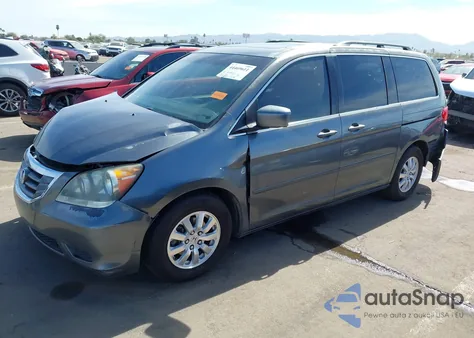 2010 Honda Odyssey Ex-L z USA, uszkodzony, nr VIN 5FNRL3H73AB057149